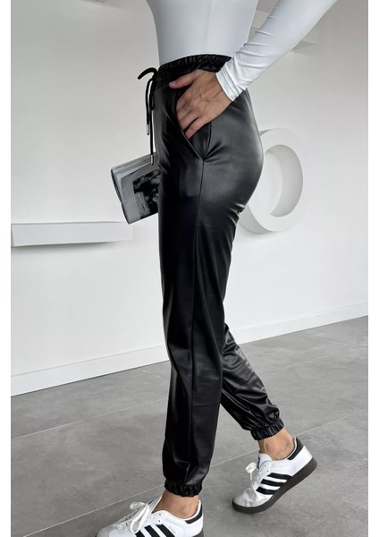 Kadın Bel ve Paça Lastikli Suni Deri Pantolon P-00018468 modelleri