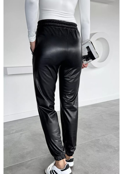 Kadın Bel ve Paça Lastikli Suni Deri Pantolon P-00018468 fırsatları