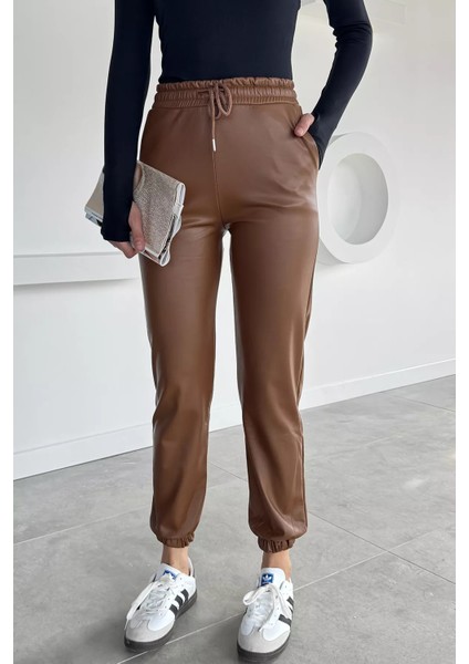 Kadın Bel ve Paça Lastikli Suni Deri Pantolon P-00018468 modelleri