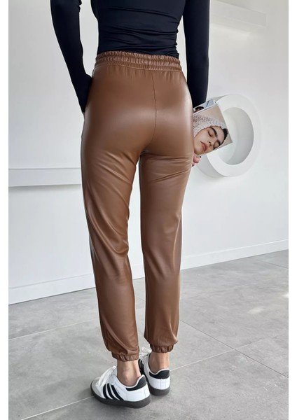 Kadın Bel ve Paça Lastikli Suni Deri Pantolon P-00018468 indirimleri