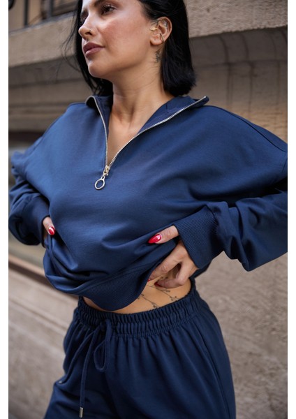 Kadın Yarım Fermuarlı Sweatshırt ve Paçası Lastikli Eşofman Takımı fiyatları