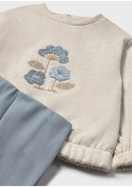 1-4 Yaş Kız Bebek Ikili Takım – Çiçek Detaylı Bej Şardonlu Sweat ve Mavi Bol Paça Tayt modelleri