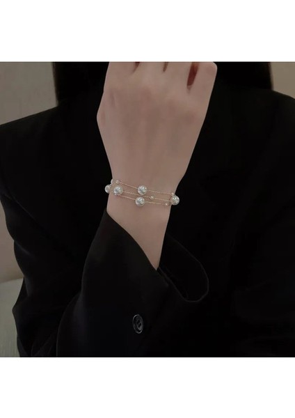 Şıklığı ve Zarafeti Yansıtan 3'lü Inci Bileklik