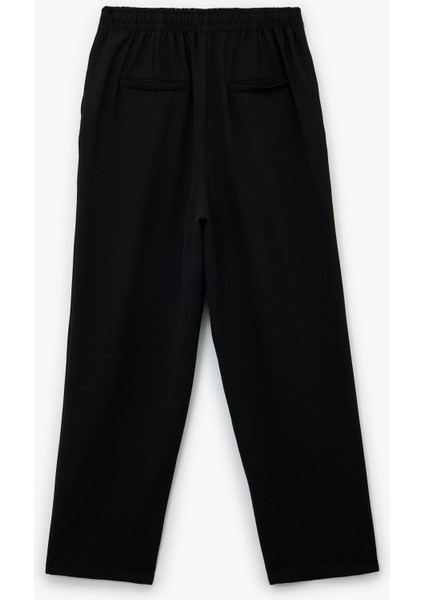 Yüksek Bel Metal Aksesuarlı Cep Detaylı Beli Lastikli Havuç Pantolon fiyatları