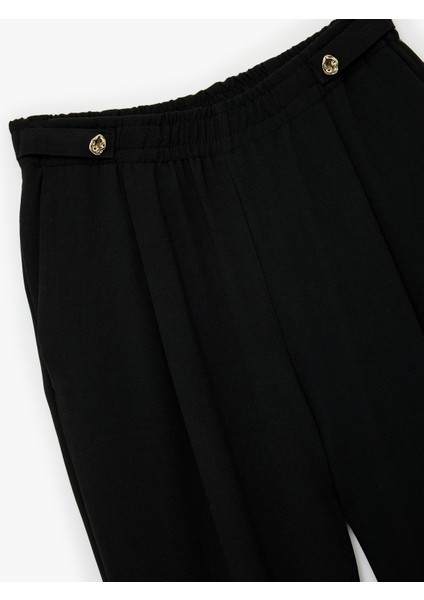 Yüksek Bel Metal Aksesuarlı Cep Detaylı Beli Lastikli Havuç Pantolon modelleri