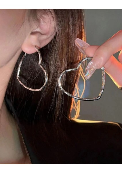 Kalp Detaylı Küpe fırsatları