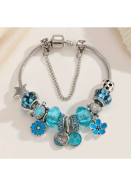 Pandora Tarz , Okyanus Serisi Turkuaz Charmlı Gümüş Bileklik, Ahşap Kutu Içerisinde modelleri