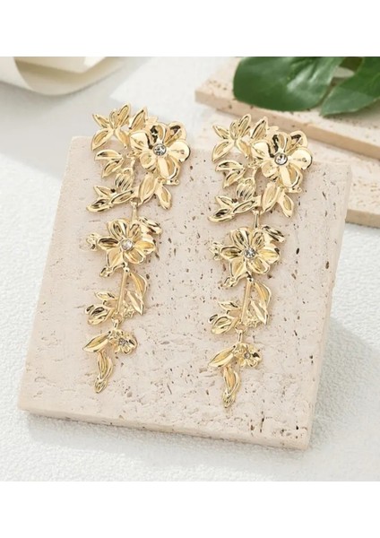Gold Renkli Büyük Taşlı Çiçek Desenli Gösterişli Küpe fiyatları