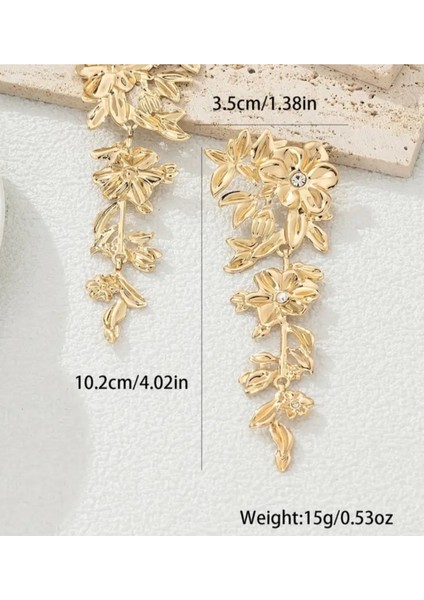 Gold Renkli Büyük Taşlı Çiçek Desenli Gösterişli Küpe modelleri