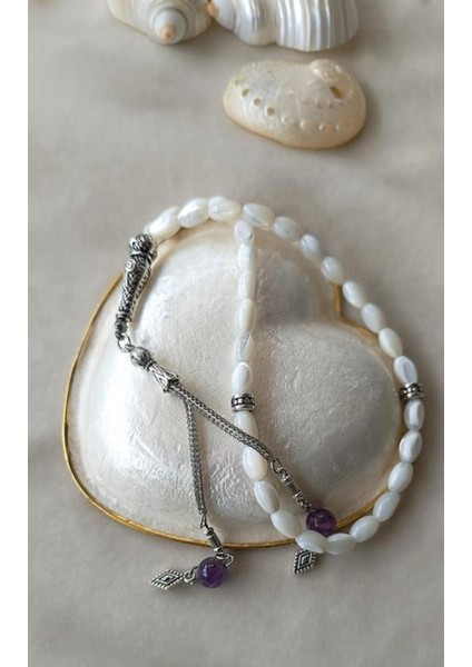 Beyaz Sedef Ametist 33’lü Arpa Kesim Tesbih Püskül ile Şıklık ve Zarafet modelleri