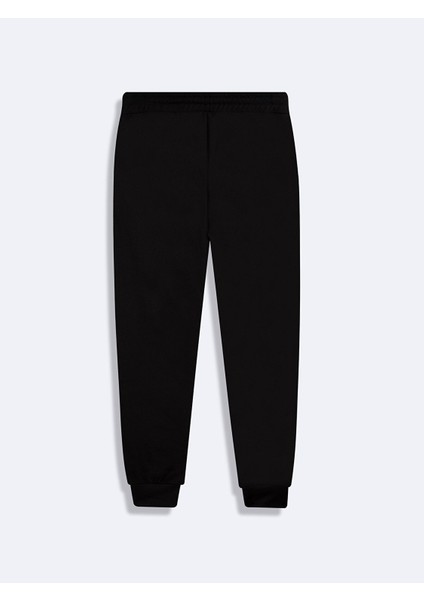 Beli Lastikli Dar Paça Siyah Eşofman modelleri