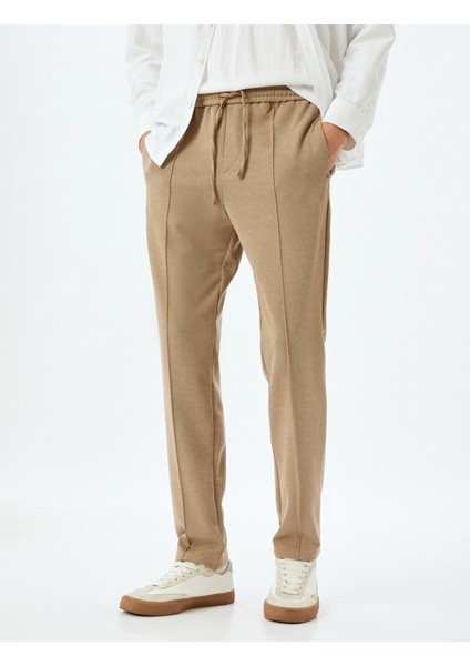 Beli Bağcıklı Viskon Karışımlı Cepli Dikiş Detaylı Chino Eşofman Pantolon modelleri