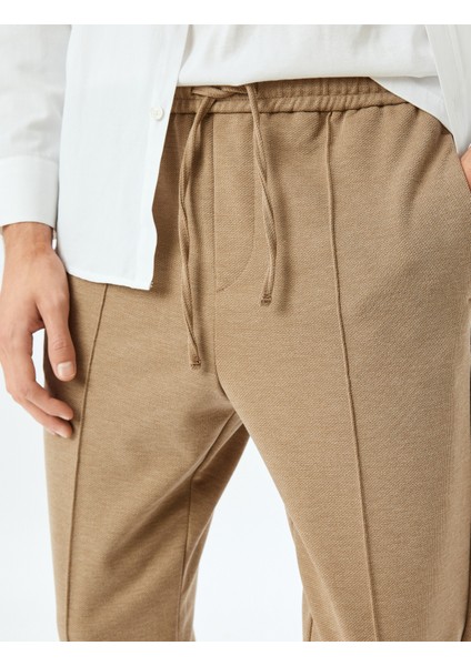 Beli Bağcıklı Viskon Karışımlı Cepli Dikiş Detaylı Chino Eşofman Pantolon indirimleri
