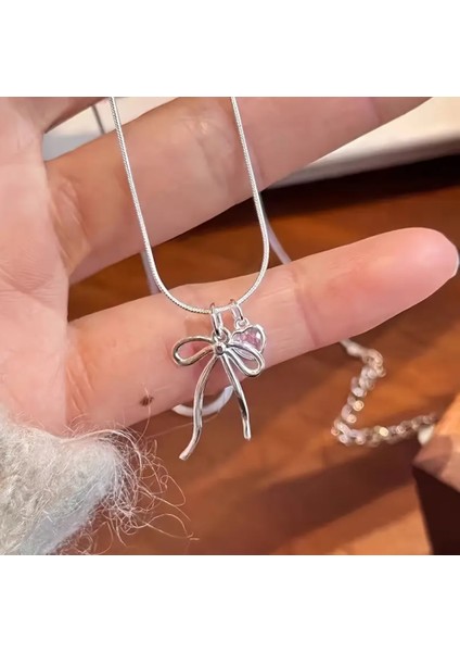 Kalpli Fiyonk Kurdele Kolye Gümüş Kaplama Çelik Kadın Kolye - Sevgiliye Hediye - Pinterest Kolye fırsatları