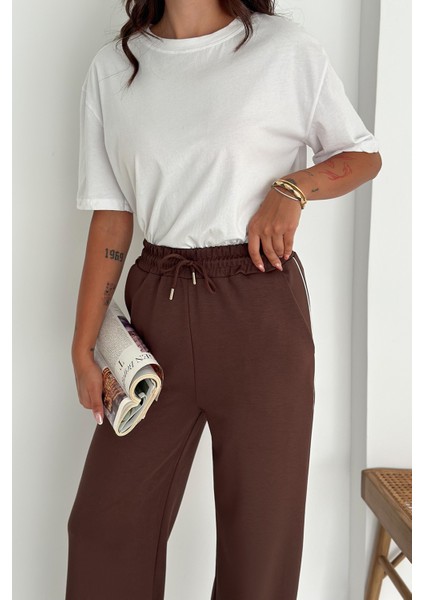 Kadın Lastikli Bel Bağcıklı Bol Paça Pantolon – Rahat & Minimal Stil fırsatları