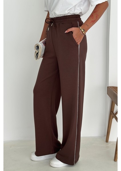 Kadın Lastikli Bel Bağcıklı Bol Paça Pantolon – Rahat & Minimal Stil indirimleri