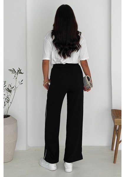 Kadın Lastikli Bel Bağcıklı Bol Paça Pantolon – Rahat & Minimal Stil modelleri