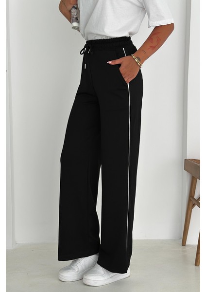 Kadın Lastikli Bel Bağcıklı Bol Paça Pantolon – Rahat & Minimal Stil fırsatları