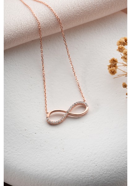 925 Ayar Gümüş Rose Kaplama Zirkon Taşlı Sonsuzluk Model Küpe fırsatları