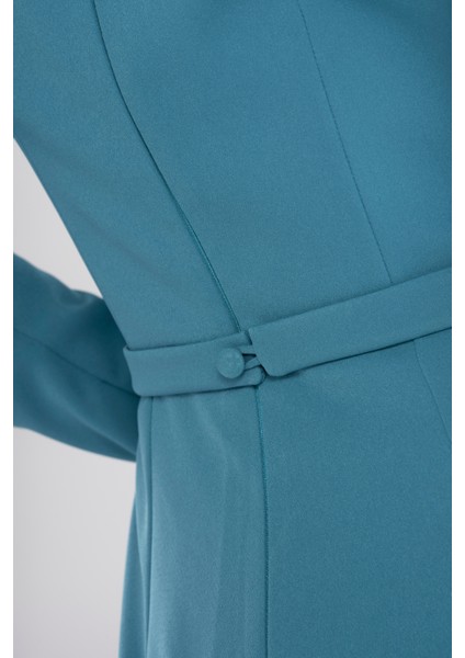 Turkuaz Omuz Açık Uzun Kollu Kuşaklı Tulum – Şık Duruşlu Kadın Abiye Tulum Gece & Davet Stili