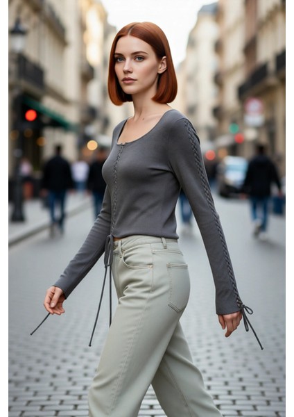 Kadın Yuvarlak Yaka Antrasit Triko Kazak Modern Tasarım Bağcık Detayı ile Şıklık Sunar Kaliteli modelleri