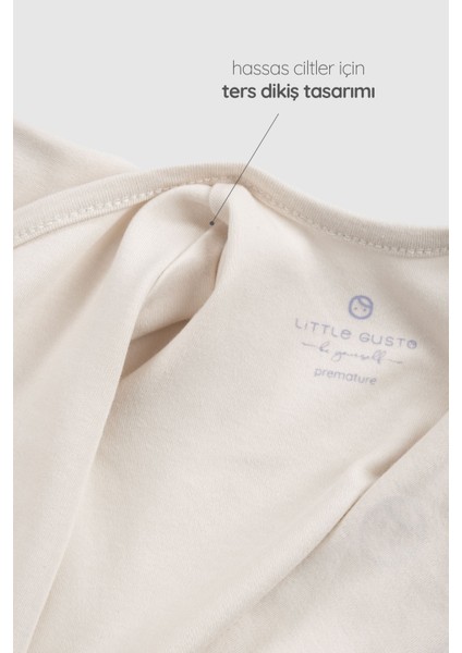 Ters Dikişli Organik Pamuk Ekru Prematüre Kruvaze Patikli Tulum fırsatları