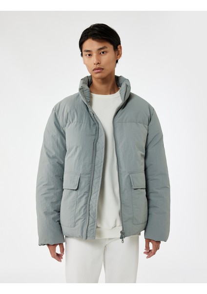 Uzun Kollu Kapaklı Cep Detaylı Fermuarlı Slim Fit Dik Yaka Şişme Mont fiyatları