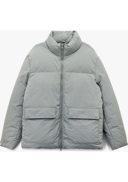 Uzun Kollu Kapaklı Cep Detaylı Fermuarlı Slim Fit Dik Yaka Şişme Mont modelleri