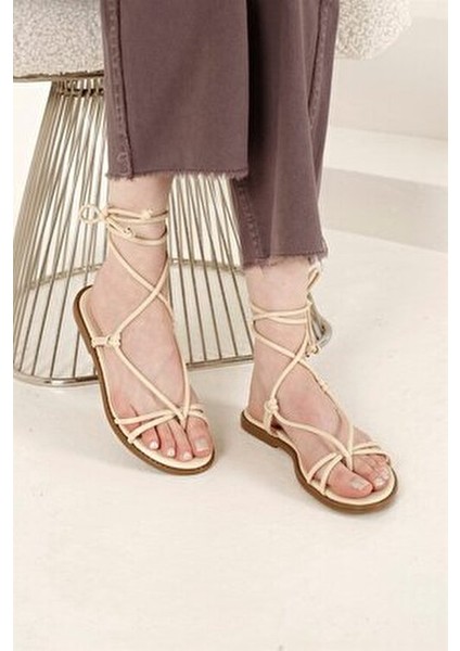 Kadın İpli Parmak Arası Sandalet Krem Renk %100 PU Deri Malzeme ile Şık Tasarım modelleri