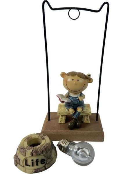 3751 Sokak Lambası Altında Kitap Okuyan Çocuk Biblo fırsatları