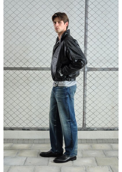 Kabartma Logolu Parçalı Siyah Deri Ceket indirimleri