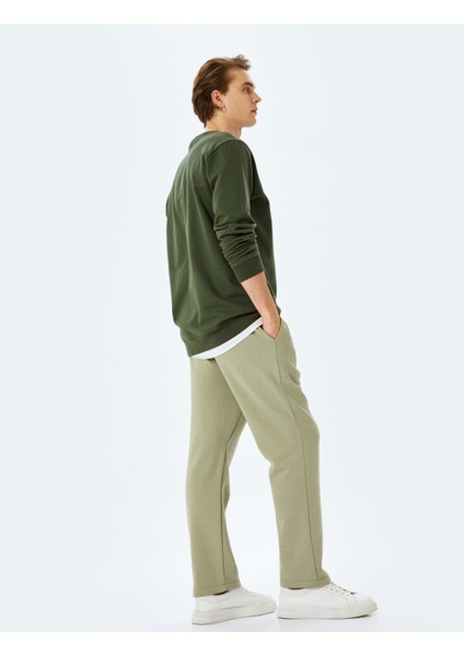 Pamuk Karışımlı Cep Detaylı Regular Fit Şardonlu Beli Bağcıklı Eşofman Altı fiyatları