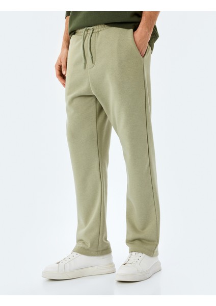 Pamuk Karışımlı Cep Detaylı Regular Fit Şardonlu Beli Bağcıklı Eşofman Altı modelleri