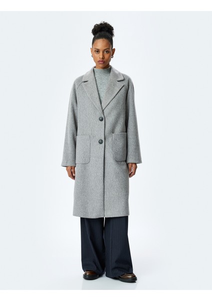 Cep Detaylı Kruvaze Yaka Uzun Kaban modelleri