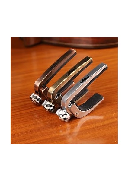 Klasik Akustik Kapo Ayarlanabilir Yastıklı Bronz Ukulele Saz Bağlama Kapo Capo fiyatları
