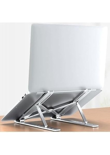 Taşınabilir Katlanabilir Folding Alüminyum Dizüstü Bilgisayar Standı Alüminyum Ayarlanabilir Açı ve Katlanabilir Portatif Rahat Kullanım 11 Inç 17 Inç Arası Kullanım Ev ve Ofis Gümüş ZR630 fiyatları