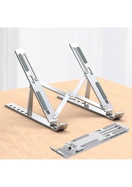 Taşınabilir Katlanabilir Folding Alüminyum Dizüstü Bilgisayar Standı Alüminyum Ayarlanabilir Açı ve Katlanabilir Portatif Rahat Kullanım 11 Inç 17 Inç Arası Kullanım Ev ve Ofis Gümüş ZR630 indirimleri