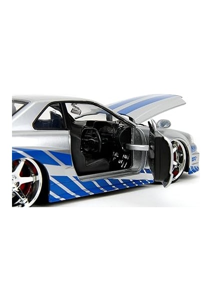 Toys Fast &amp; Furious Brian S 2002 Nissan Skyline R34 Die-Cast Car, 1:24 Scale, Silver &amp; Blue indirimleri