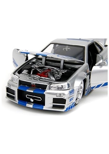 Toys Fast &amp; Furious Brian S 2002 Nissan Skyline R34 Die-Cast Car, 1:24 Scale, Silver &amp; Blue fırsatları