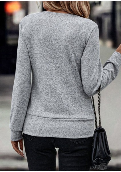 Kadın Uzun Kollu Kruvaze Yaka Kol ve Etek Ucu Manşet Detay Yumoş Bluz fiyatları