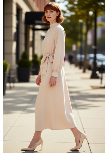 Kadın Dik Yaka Balon Kollu Kuşaklı Düz Dokuma A Kesim Maxi Elbise Rahatlığı Zarafetle Birleştiriyor modelleri