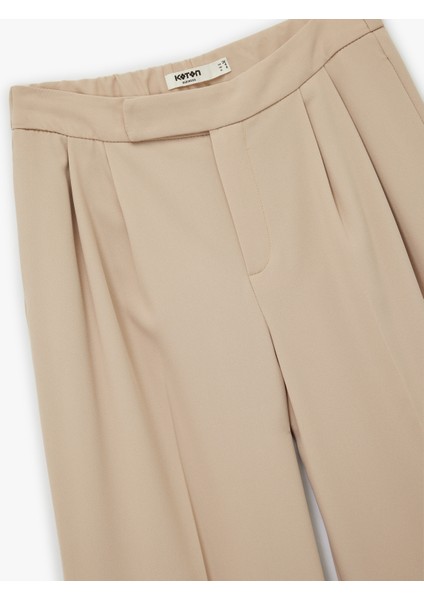 Pile Detaylı Düz Geniş Kısa Paça Kumaş Pantolon modelleri