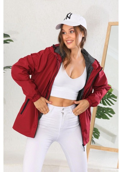 İçi Astarlı Su ve Rüzgar Geçirmez Cepli Kadın Yağmurluk