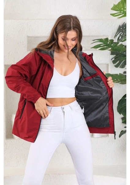 İçi Astarlı Su ve Rüzgar Geçirmez Cepli Kadın Yağmurluk