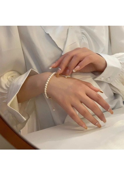 Şıklığınızı Tamamlayacak Inci Detaylı Kadın Bileklik