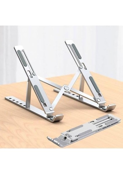 Taşınabilir Katlanabilir Folding Alüminyum Dizüstü Bilgisayar Standı Alüminyum Ayarlanabilir Açı ve Katlanabilir Portatif Rahat Kullanım 11 Inç 17 Inç Arası Kullanım Ev ve Ofis Gümüş ZR630 fiyatları