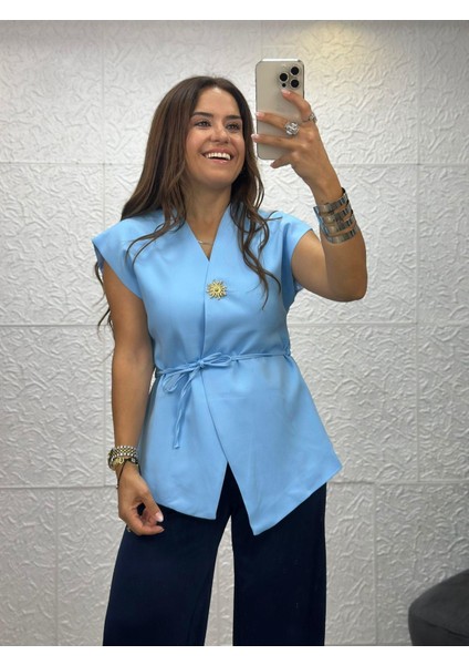 Güneş Düğmeli Mavi Yelek fırsatları