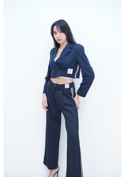 Şerit ve Etiket Detaylı Pantolon fiyatları