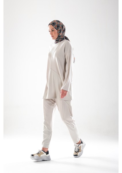 2283_PATCH ve Dikiş Detaylı Esnek Kumaş Tesettür Kadın Spor Eşofman Takımı –cepli Havuç Fit Pantolon modelleri