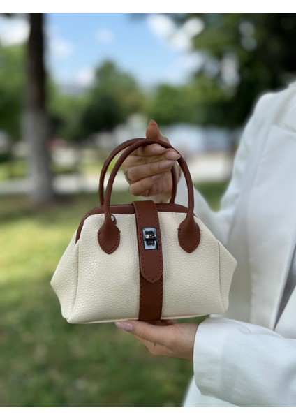 Nçs Kadın El ve Omuz Çantası -Zerafetin Minimal Hali(En:18~boy:13) modelleri